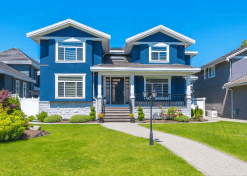 A blue house that can be made yours through a loan